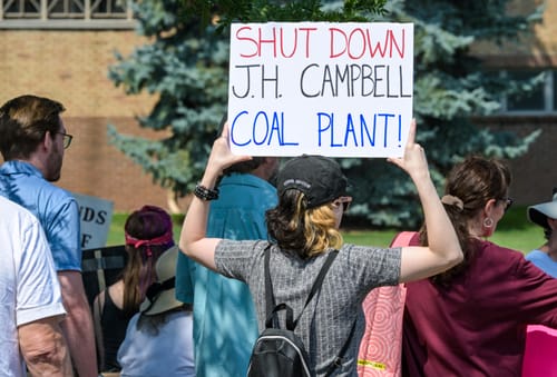Protestors rally in Holland, call for Campbell coal plant to close post image