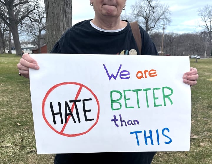 Holland residents host unity march to show solidarity against Trump Administration's actions